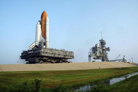 Atlantis rolls from the VAB for STS-115 