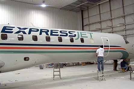Xpress Jet in hangar W445